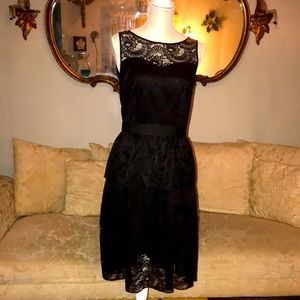 Elegant black lace dress by “IMNYC”